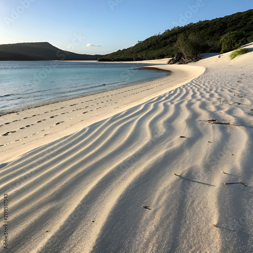 Smooth, warm sand creates a minimalist natural texture.