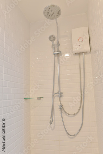 Water heater with shower in bathroom