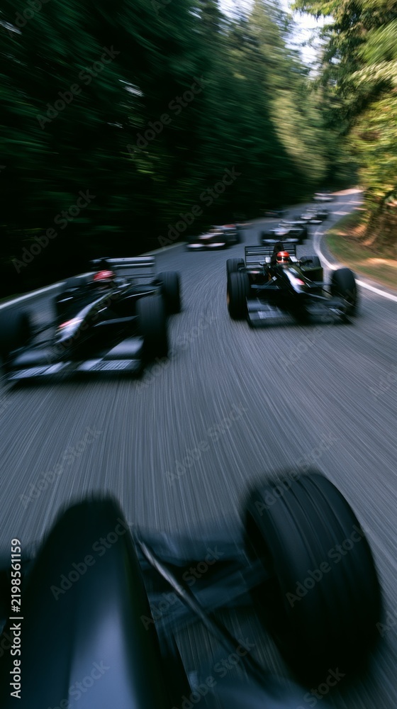 Obraz premium Formula 1 race cars speeding through a circuit turn