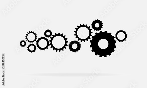 gears on white background. A collection of gears. The gears come in various sizes, creating a mesmerizing pattern of movement and connection