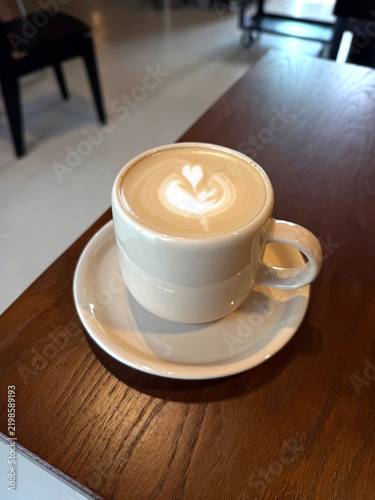 Foto Cup of cappuccino on a table