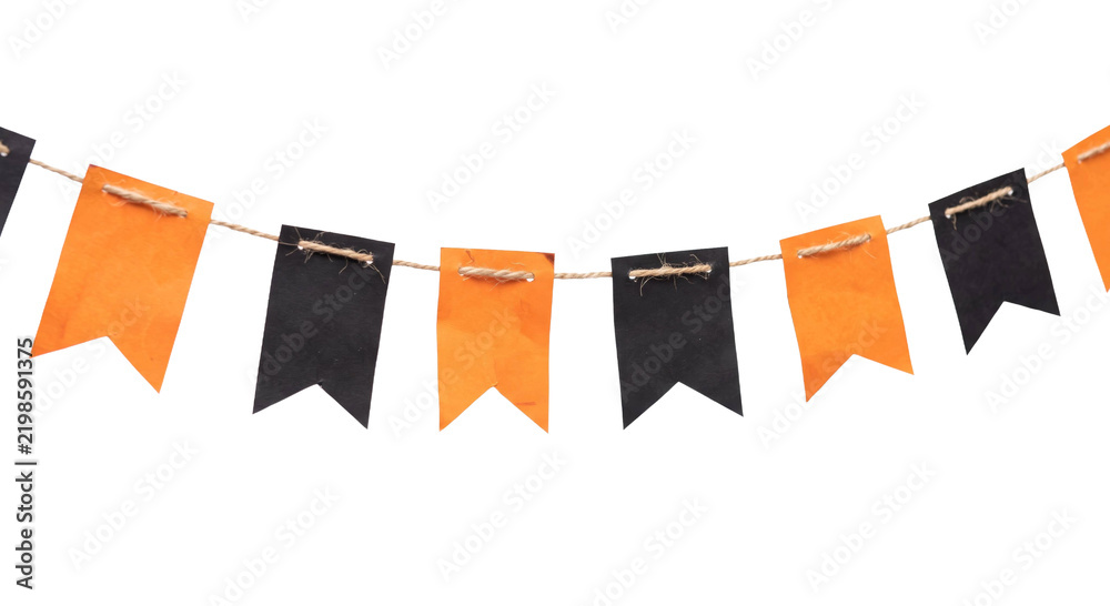 Obraz premium Festive Halloween bunting banner with orange and black paper flags hanging on a rustic twine string