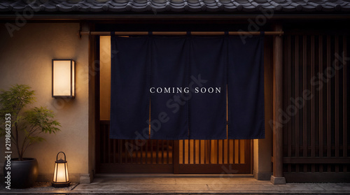 Traditional Japanese restaurant entrance with dark indigo noren Curtain writing Coming Soon