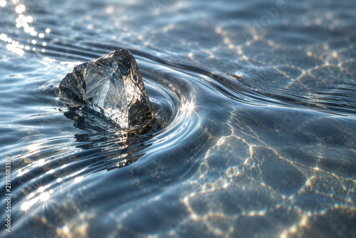 Crystal Emerging from Rippling Water Surface