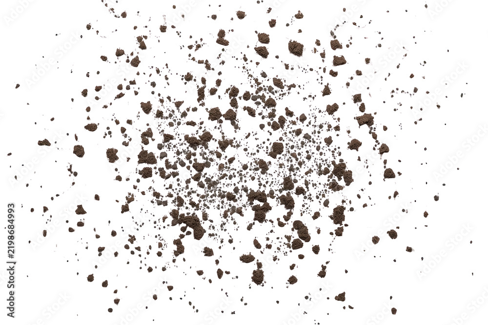 Obraz premium Fine brown soil particles scattered in a dense spray