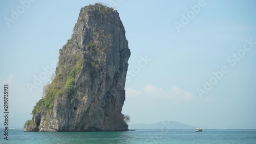 Ko Poda with tourist boat or long tailed boats sailing deep blue sea ocean to marine with natural mountain island for daylight seascape nature landscape to summer holiday travel at Krabi in Thailand