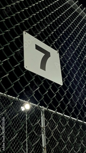number seven on a fence