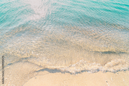 Naklejka waves on the beach, vacation background