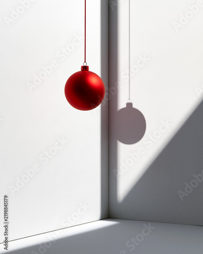 Corporate Christmas card photoshoot with a hanging ornament