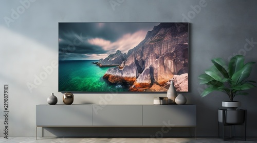 A photo of an LED TV mounted on a modern wall.