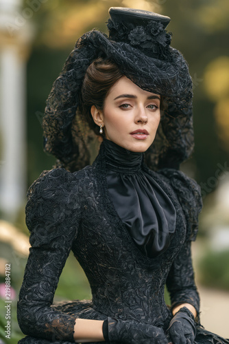 Elegant Victorian Woman in Mourning Dress