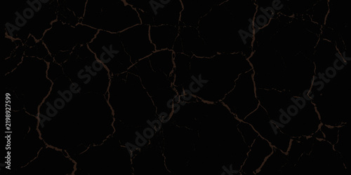 Black marble surface with thin copper veining and fine cracks, dark stone texture