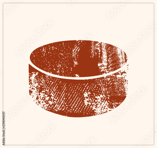 Obraz na plátně Worn ice hockey puck, the classic rubber biscuit of the rink, in rough stippled texture