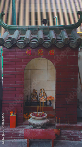 A Chinese Earth God shrine, also known as a Tu Di Gong (Fu De Zheng Shen shrine), a grand site of intangible cultural heritage and diety devotion in Tai Wong Ye Temple in Wong Chuk Hang, Hong Kong