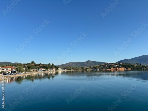 Konstfotografi The unmatched beauty of Greek settlements nestled in Aegean bays, seen during a sea voyage on a sunny summer day