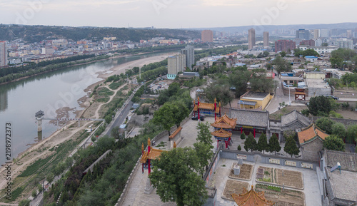 Fotografie Aerial view of riverside temple and Yellow River in Fugu County, Shaanxi, China
