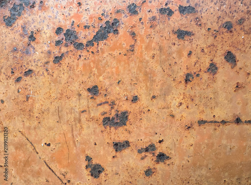 heavily rusted metal surface with deep corrosion spots background