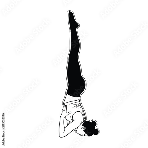 Woman doing headstand yoga pose