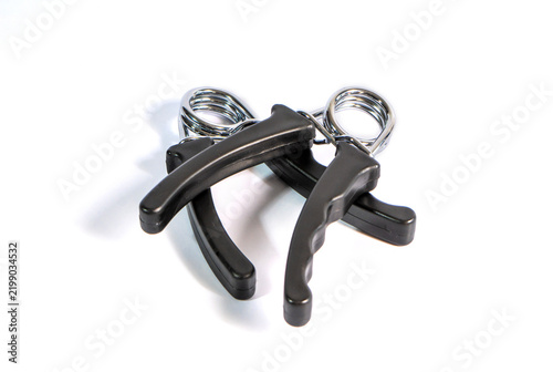 A pairs of black hand grip strengthener with a metal torsion spring, isolated on a clean white background. Designed for wrist, hand, and forearm exercise.