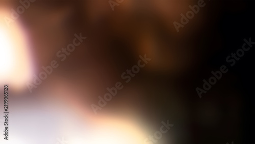 Obraz na płótnie Abstract blurred background, with warm light, leaks and dark shadows