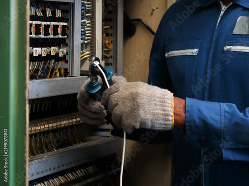 body part hand person people glove technical circuit service maintenance electric repair engineer industry equipment tool system voltage work job switch infrastructure testing fuse wiring energy power