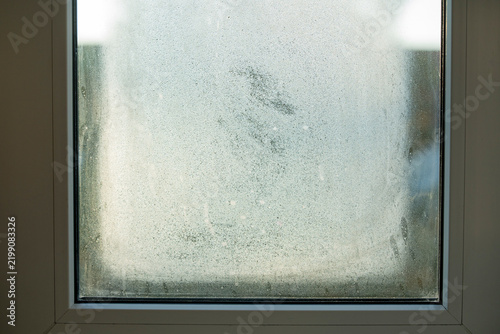 Condensation on a Fogged Window Caused by High Indoor Humidity and Poor Heating