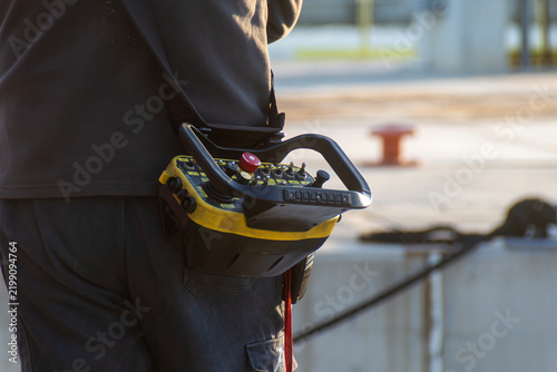 Fotografie close-up of portable industrial radio remote control used for safely operating h
