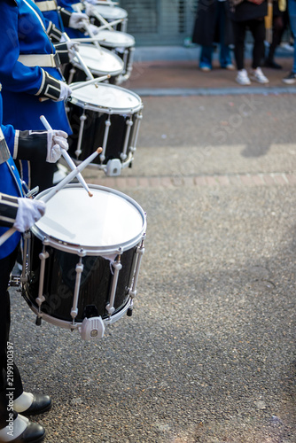  Close-Up of Snare Drums and Drummers in a Marching Band Parade