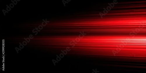 Abstract red light streaks moving horizontally across a dark background