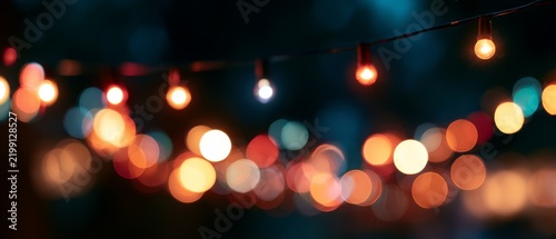 Colorful string lights glowing in the night