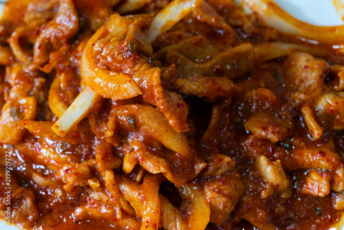 Macro Full-Frame Texture of Glossy Korean Spicy Stir-Fried Pork