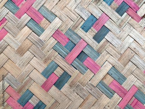 Close-up photo of a woven bamboo fan 