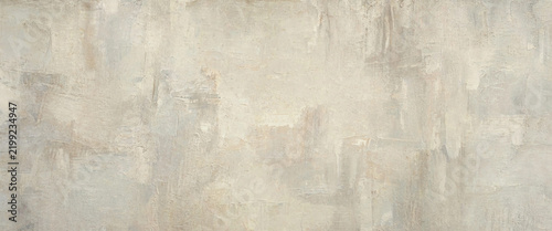 Abstract Textured Background With Neutral Brush Strokes And Subtle Gray And Cream Paint Variations. Abstract Artistic Wall Texture With Beige And White Brush Strokes Creating A Soft Aged Vintage