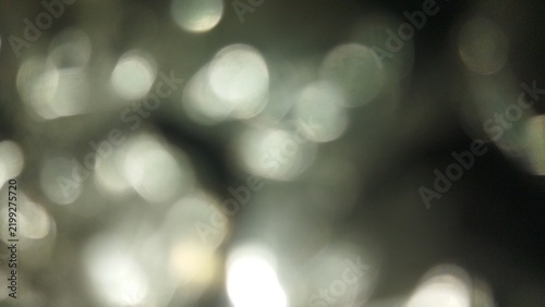 Abstract Blurry Silver Bokeh Lights Defocused Glimmer Texture Background