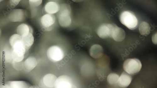 Abstract Blurry Silver Bokeh Lights Defocused Glimmer Texture Background