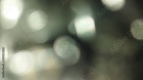 Abstract Blurry Silver Bokeh Lights Defocused Glimmer Texture Background