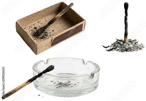 Fotografía A collection of spent matches, ash, and a glass ashtray in a realistic documentary style