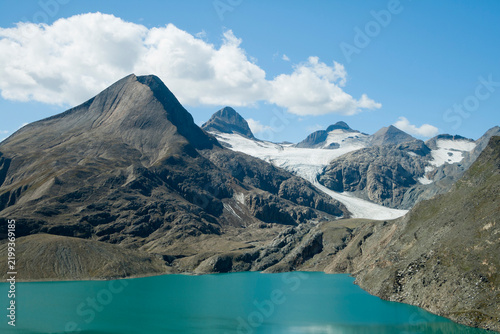 Turquoise Alpine Lake and Glacial Peaks Landscape