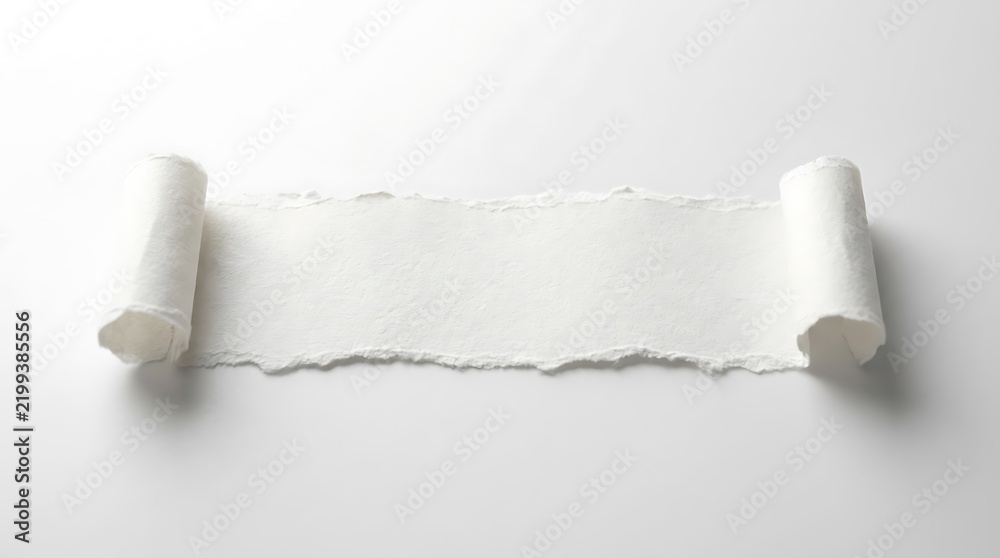Obraz premium White handmade paper scroll with ripped deckle edges unrolled on a clean light background with soft shadows