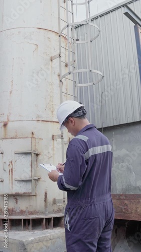 Engineering work taking note report check maintenance Exhaust system concept Clean air environmental protection.Factory industrial manufacturing. Sustainable future environment air pollution reduction