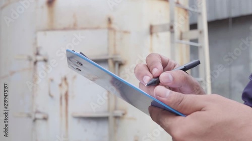 Engineering work taking note report check maintenance Exhaust system concept Clean air environmental protection.Factory industrial manufacturing. Sustainable future environment air pollution reduction