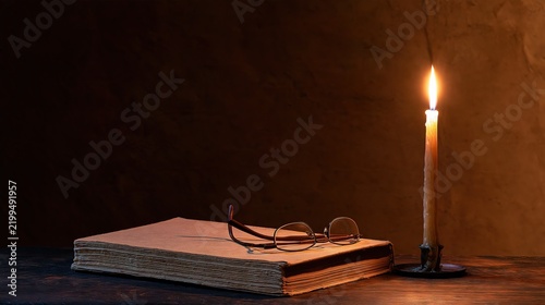 Quiet Reading Concept in Warm Candlelight