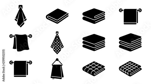 Towels icon set featuring folded and hanging cloth designs in black silhouette vector