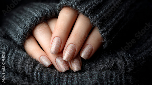 Female Hands with Beige Glitter Nail Polish, Elegant Nude Manicure and Nail Art Design
