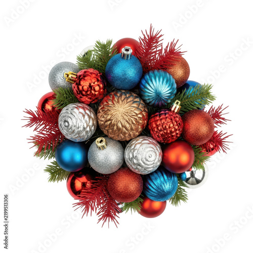 Top view composition of colorful christmas ornaments and pine branches isolated on white