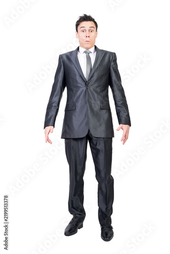 Cuadro en lienzo Full length of serious young male manager in formal suit and tie with dark hair