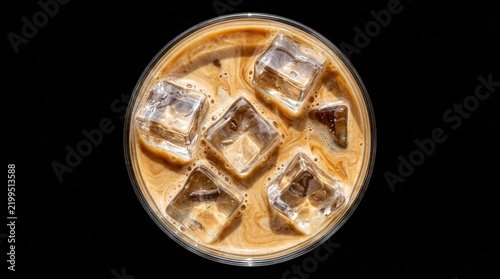 Top side view of an iced coffee cup showcasing ice cubes from above.