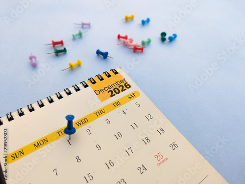 First december date marked on calendar 2026 with push pin