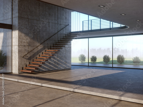 Modern empty interior with staircase and glass walls, daytime