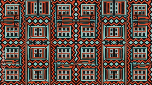 Geometric tribal pattern with orange and teal zigzag motifs